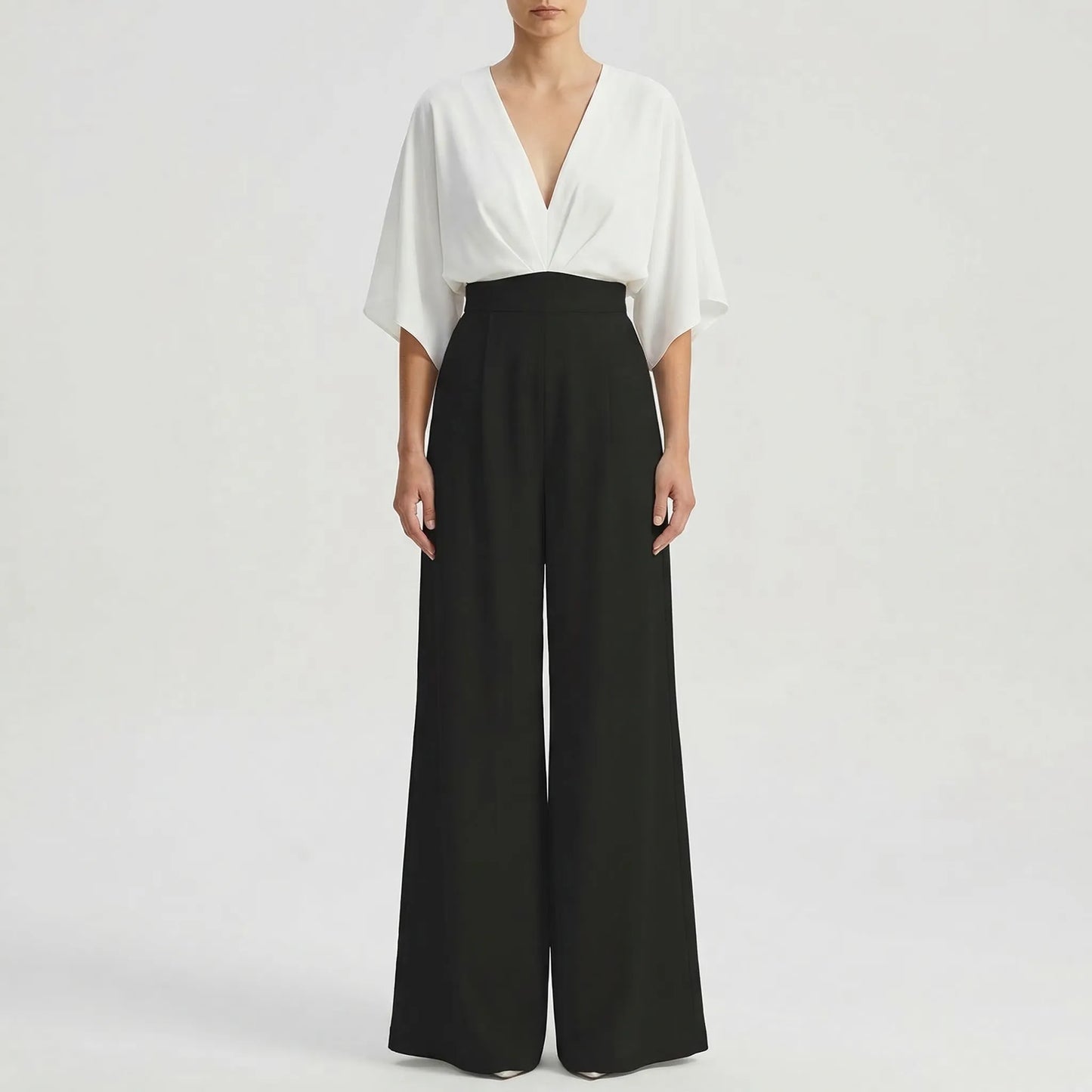Velouxa - Wide-Leg Deep V-Neck Jumpsuit