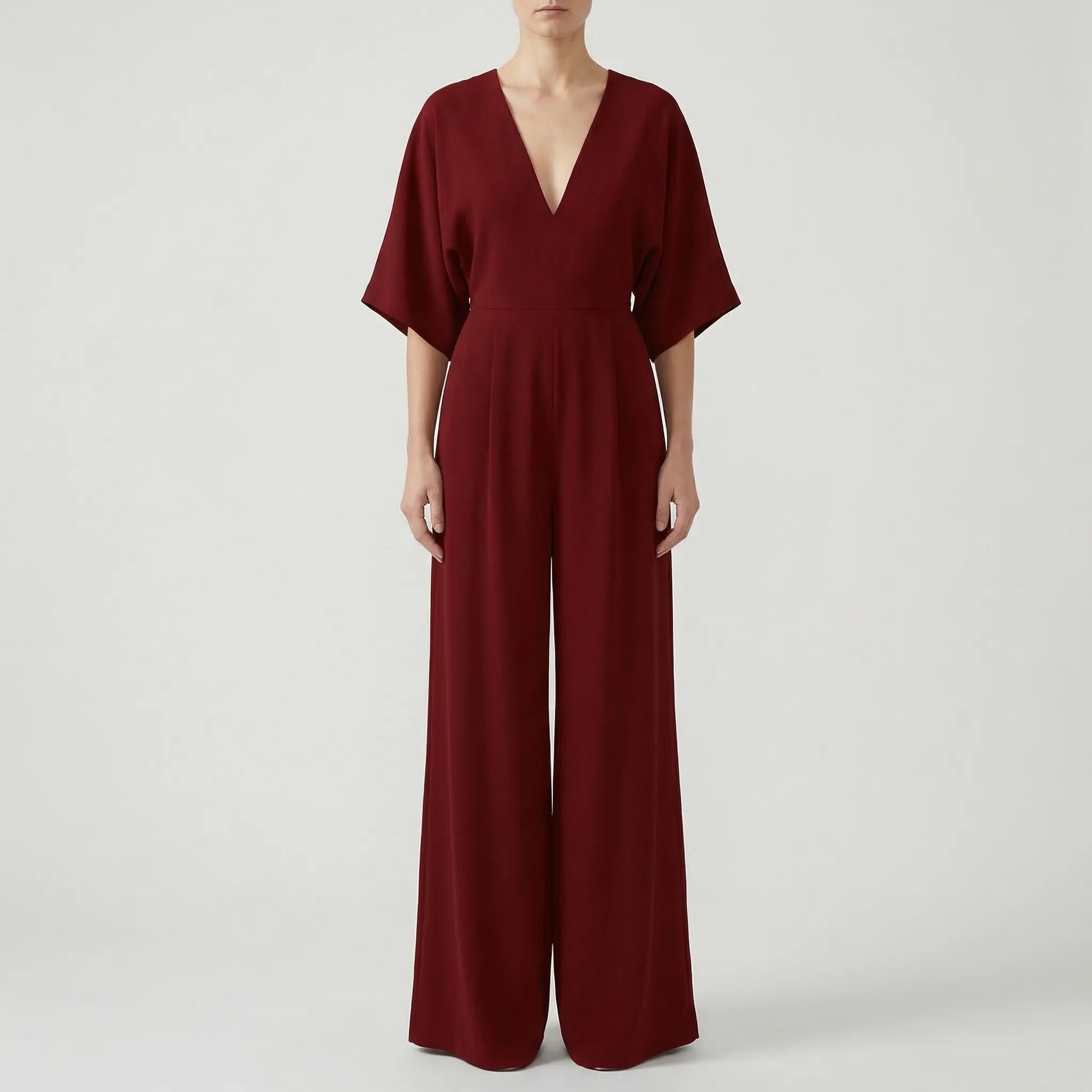 Velouxa - Wide-Leg Deep V-Neck Jumpsuit